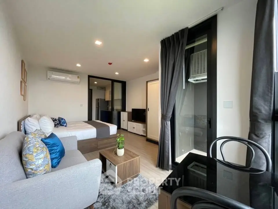 Modern studio apartment with stylish decor and natural light
