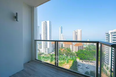 Stunning high-rise balcony with panoramic city views and modern railing design.