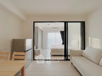 Modern studio apartment with open layout and natural light