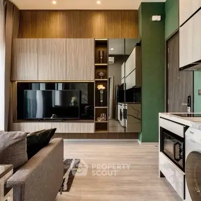 Modern living room with sleek design and integrated kitchen appliances