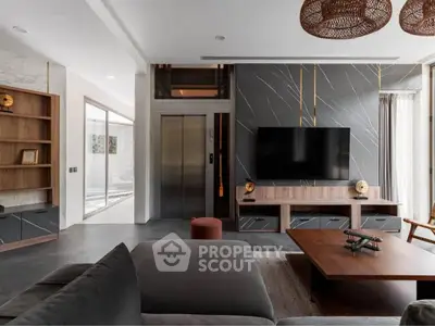 Luxurious modern living room with elevator and stylish decor
