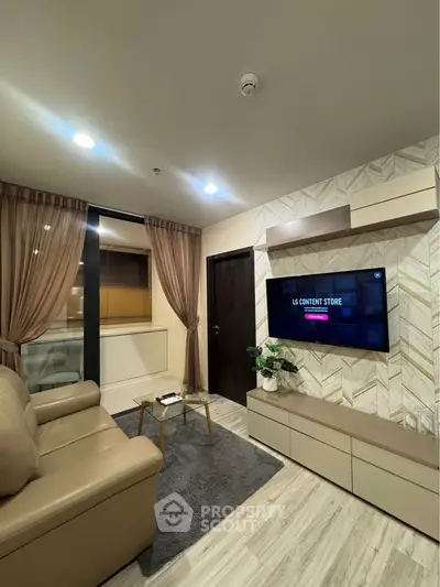 Modern living room with stylish decor and wall-mounted TV