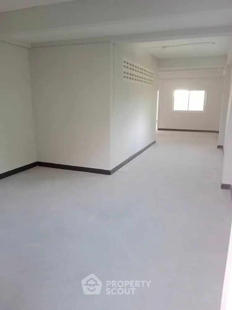Spacious open-plan interior with natural light and modern design.