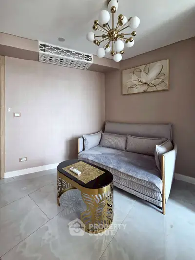 Elegant living room with modern sofa and stylish chandelier