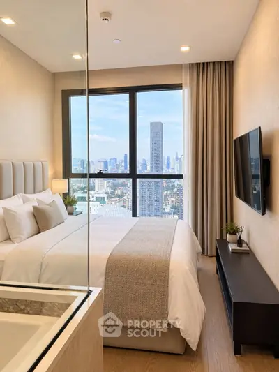 Luxurious bedroom with stunning city view and modern decor