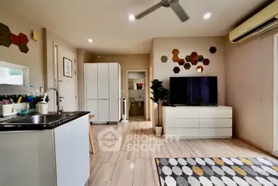 Modern living room with stylish decor, open layout, and sleek appliances, perfect for contemporary living.