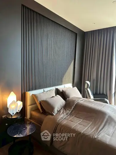 Luxurious modern bedroom with elegant decor and ambient lighting