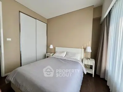 Cozy modern bedroom with elegant decor and natural light