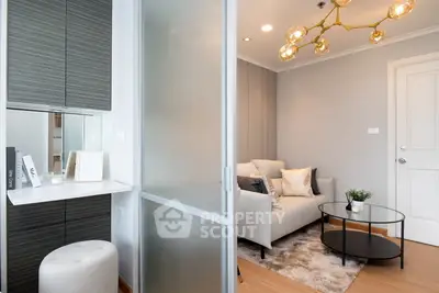 Modern living room with stylish decor and elegant lighting