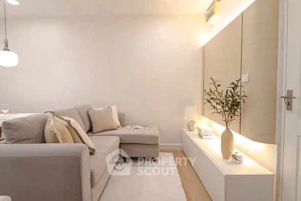 Cozy and modern living room with stylish decor and comfortable seating.