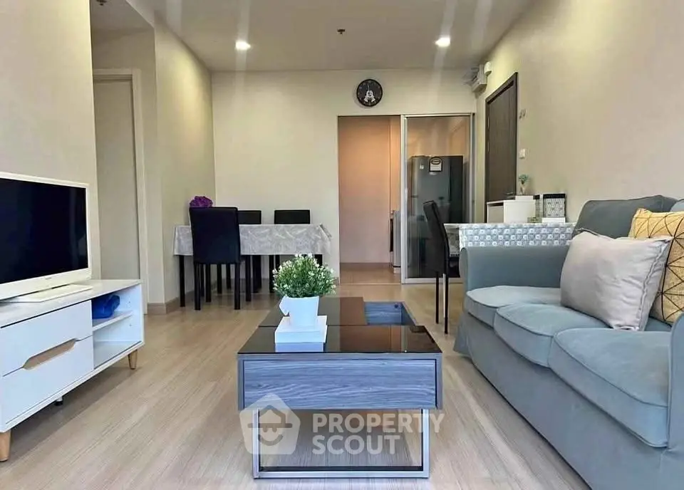 Modern living room with stylish furniture and open layout, perfect for relaxation and entertainment.