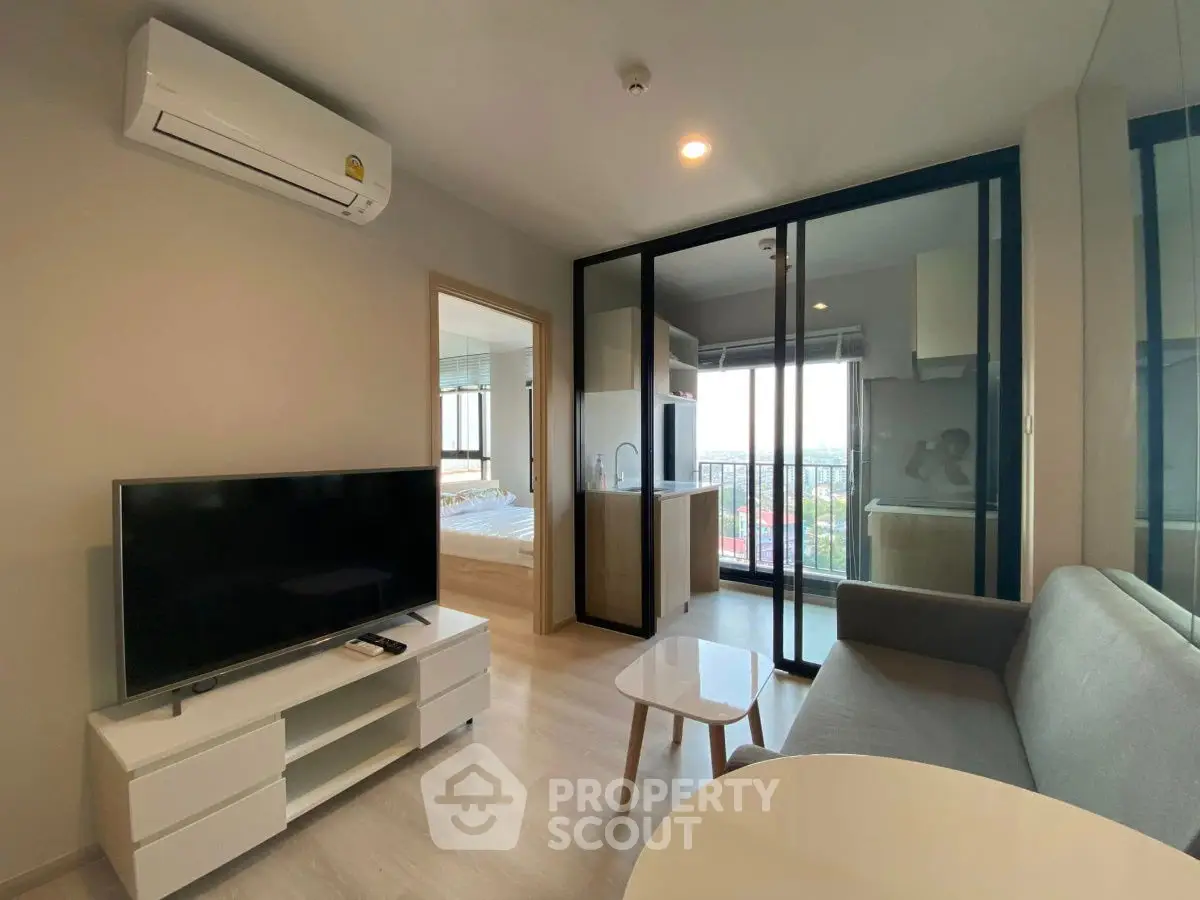 Modern living room with balcony view in stylish apartment