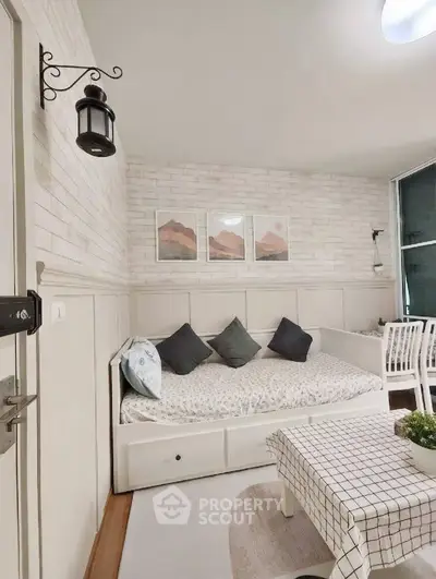 Charming living room with cozy daybed and stylish decor