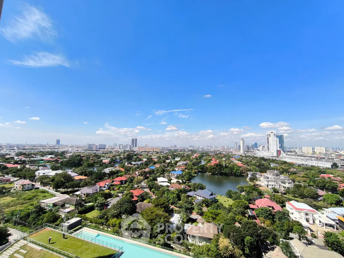 Stunning cityscape view with lush greenery and skyline, perfect for urban living enthusiasts.