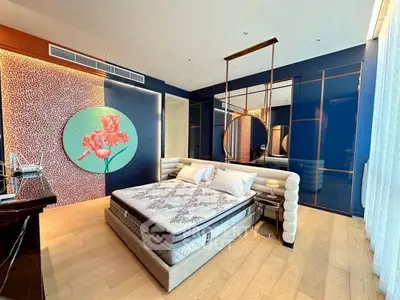 Luxurious bedroom with modern decor and stylish wall art