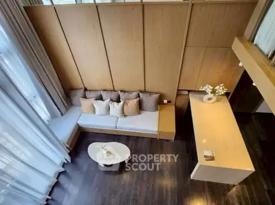 Modern living room with high ceiling and elegant decor