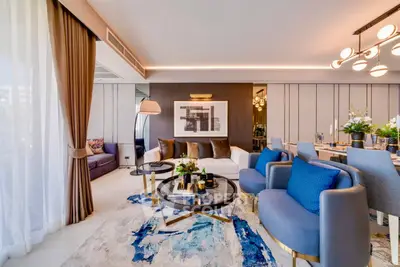 Luxurious modern living room with elegant decor and stylish furniture, perfect for sophisticated urban living.