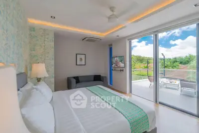 Luxurious bedroom with balcony and stunning view, featuring modern decor and ample natural light.