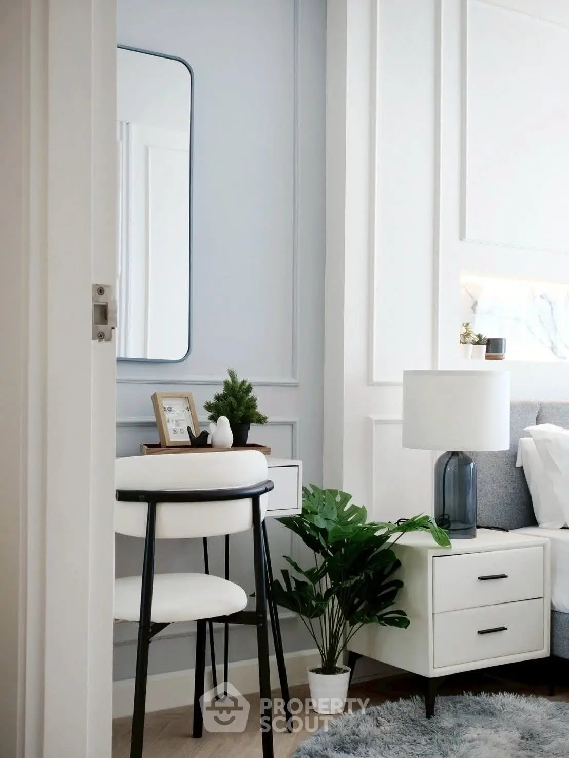 Stylish bedroom corner with modern decor and cozy ambiance