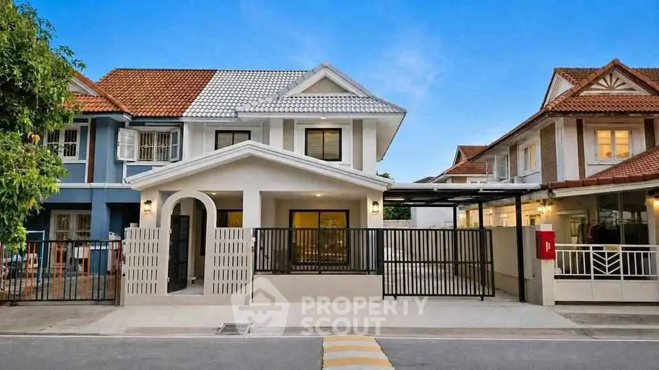 Charming suburban house with modern facade and spacious driveway in a serene neighborhood.
