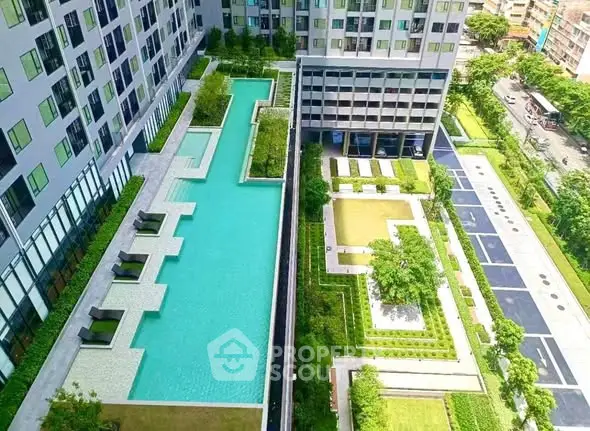 Luxurious condominium with stunning pool and landscaped gardens offering urban tranquility.