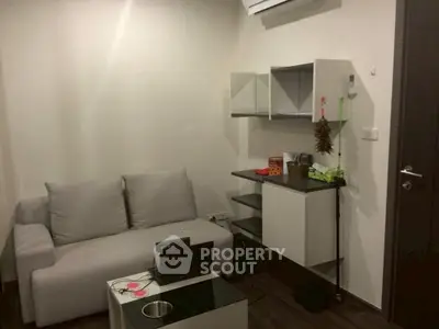 Cozy living room with modern furniture and wall-mounted shelves