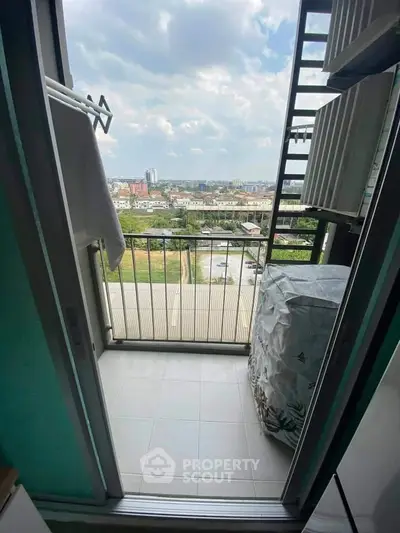 Charming balcony with city view, perfect for relaxation and enjoying the skyline.
