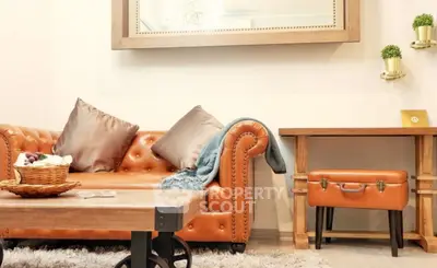 Stylish living room with leather sofa and rustic wooden furniture, perfect for cozy gatherings.