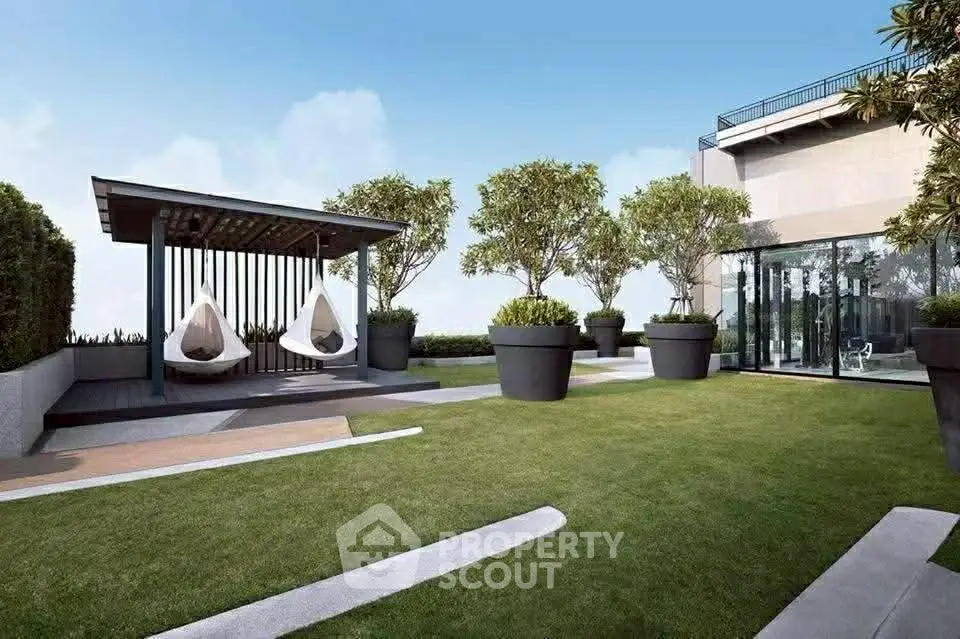 Luxurious rooftop garden with modern seating and lush greenery, perfect for relaxation and entertainment.