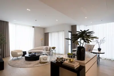 Luxurious modern living room with elegant decor and natural light