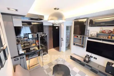 Modern living room with open kitchen, sleek design, and stylish decor in a contemporary apartment.