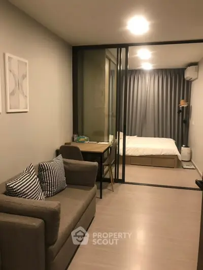 Modern apartment interior with cozy living area and stylish bedroom