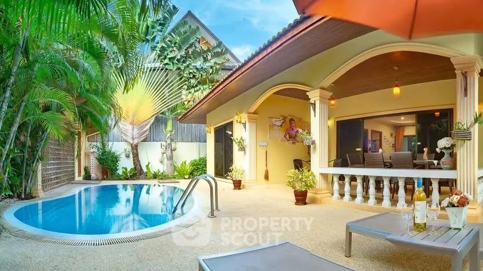 Luxurious villa with private pool and tropical garden, perfect for relaxation and entertaining.
