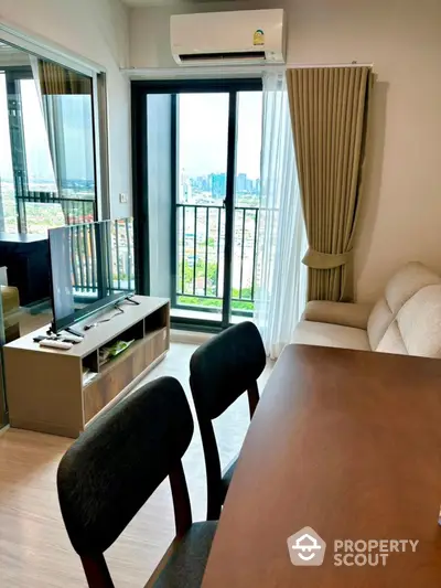 Modern living room with balcony view in high-rise apartment