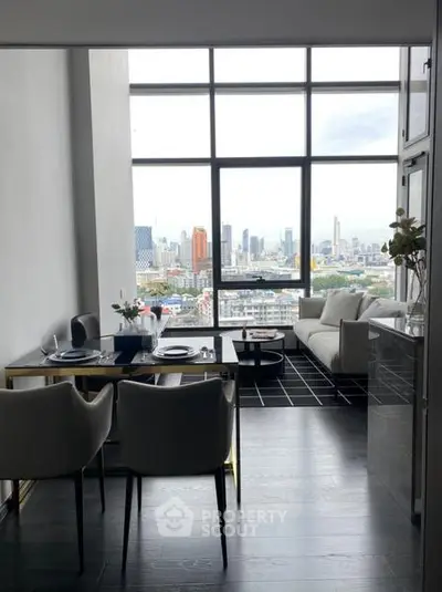Modern living room with stunning city view, elegant dining area, and floor-to-ceiling windows.