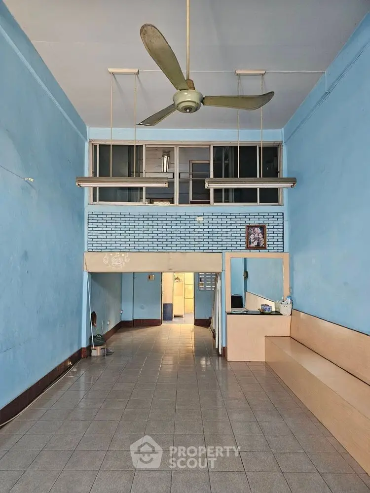 Spacious interior with high ceiling and unique mezzanine design