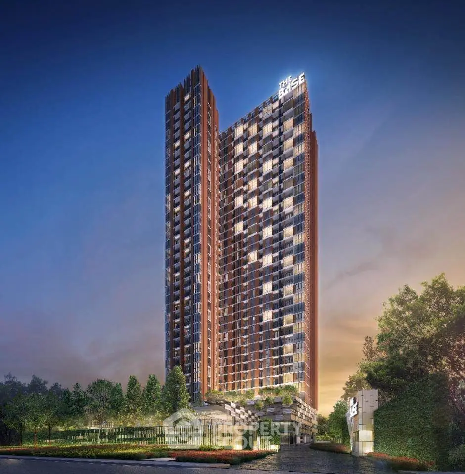 Stunning modern high-rise building with lush greenery and elegant design at sunset.