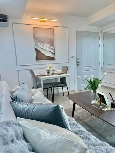 Stylish living room with elegant decor and cozy dining area