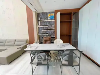 Modern living room with elegant marble table and stylish seating