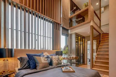 Luxurious modern bedroom with mezzanine and stylish decor