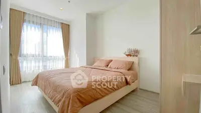 Bright and cozy bedroom with natural light and elegant decor