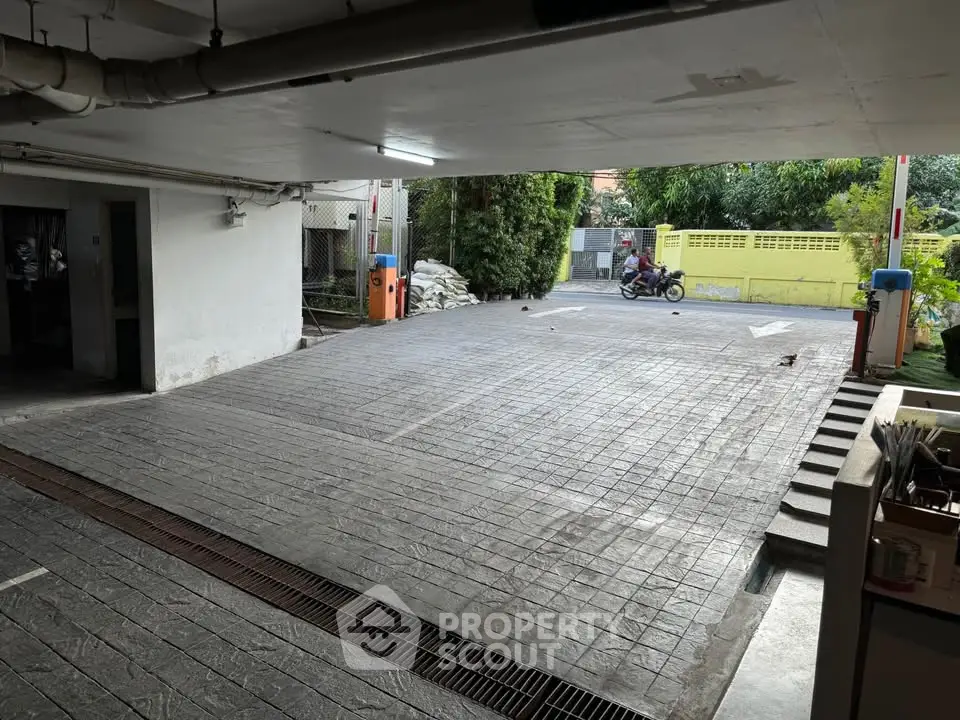 Spacious parking area with easy access and secure surroundings.