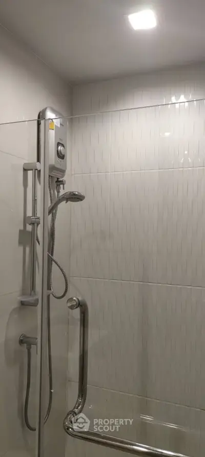 Modern bathroom shower with sleek design and stainless steel fixtures