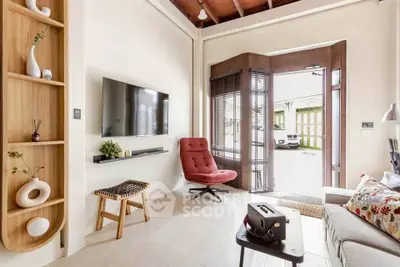 Charming living room with modern decor and natural light