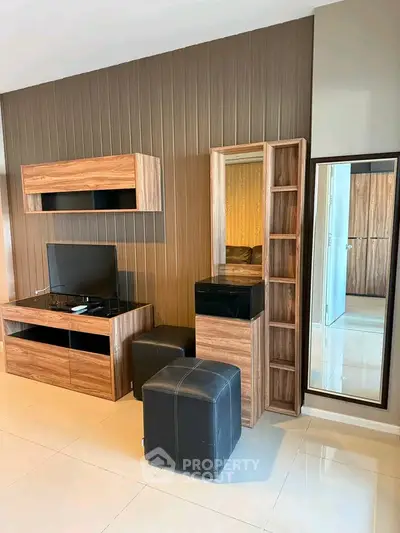 Modern living room with sleek wooden furniture and stylish decor