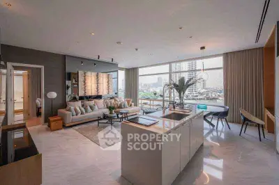 Luxurious open-plan living room with panoramic city views and modern decor.
