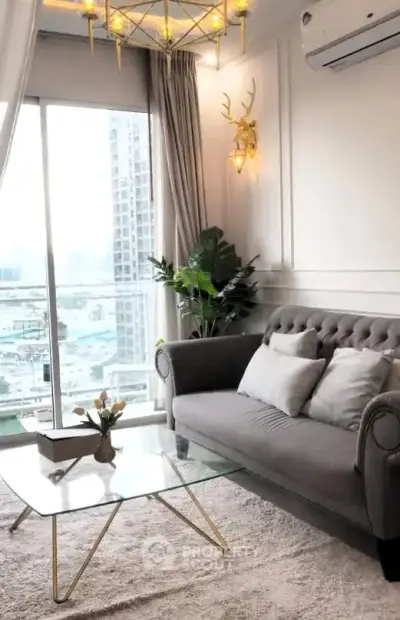 Chic living room with elegant decor and city view from large window