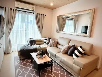 Stylish living room with modern decor and large mirror