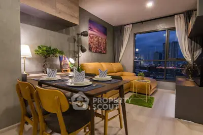Modern living room with city view, stylish decor, and cozy dining area.