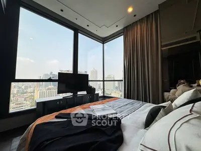 Luxurious bedroom with panoramic city view and elegant decor